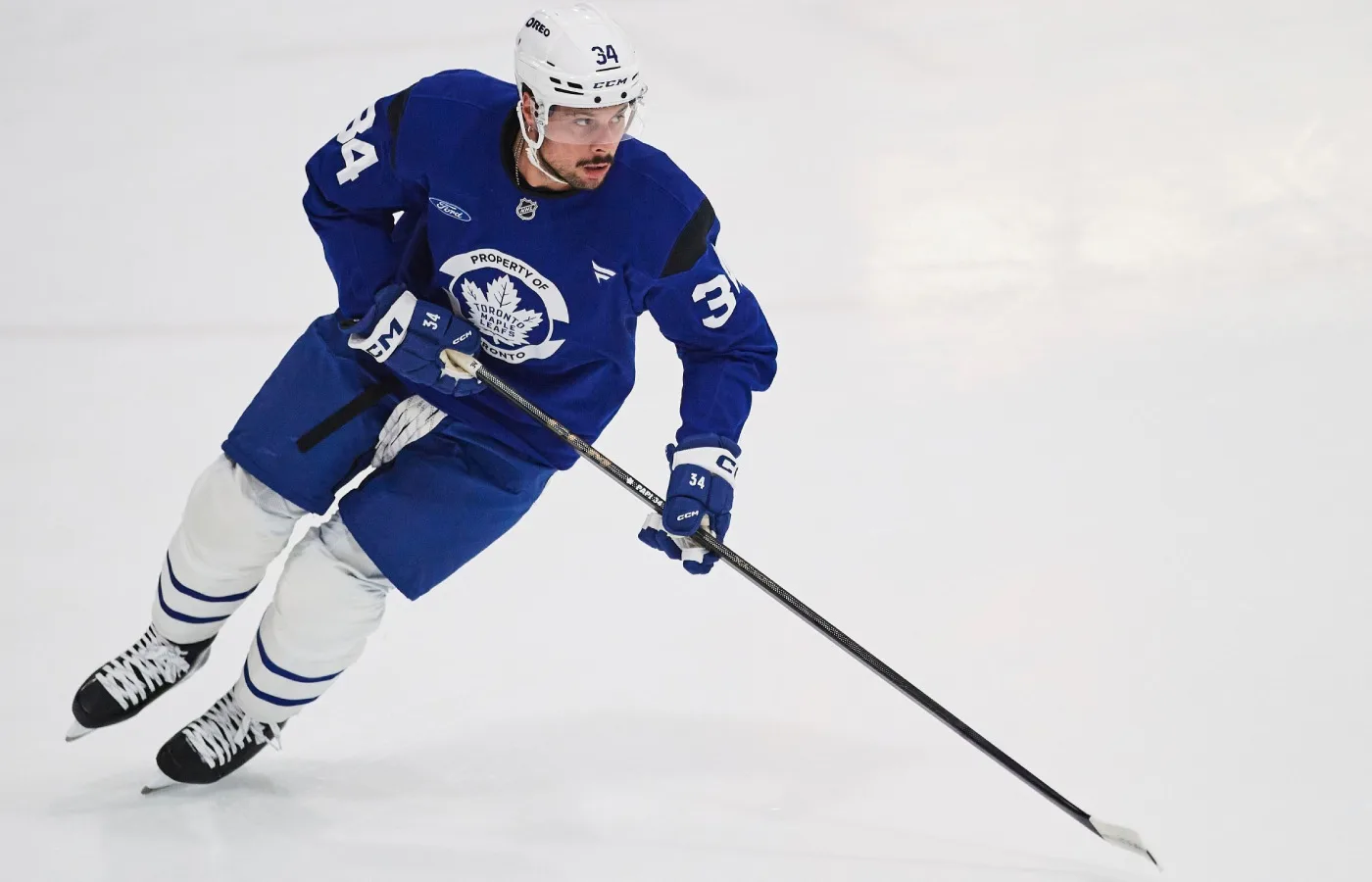 Toronto Maple Leafs forward Auston Matthews skates up the ice during the opening week of the team's NHL training camp in Toronto, on Thursday, Sept. 18, 2025. (Sammy Kogan/The Canadian Press via AP)